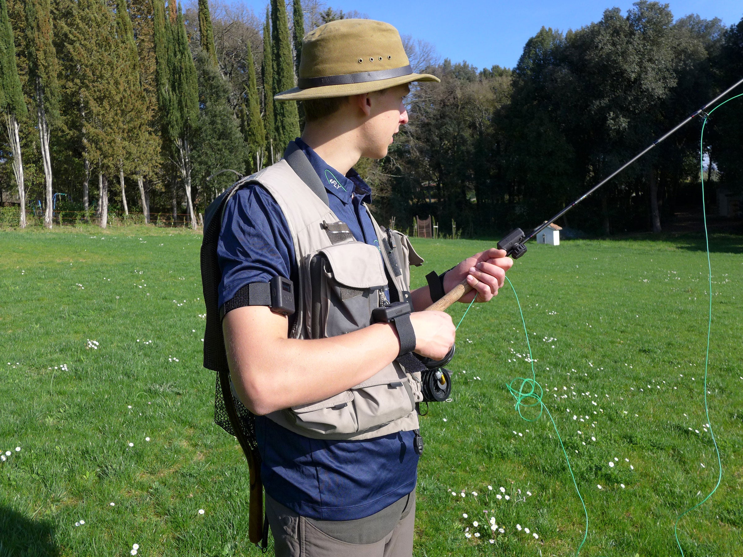 A man with the eFly Pro sensors on ready to cast and gather data.