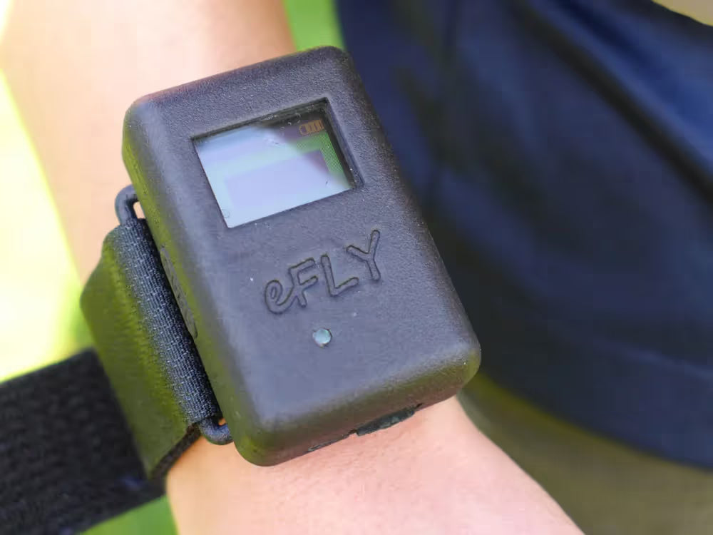 Photo of eFly Pro wrist Sensor being warn by angler